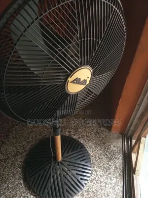 An Ava Advanced Ventilation 18-inch 5-blade Adjustable Standing Fan.