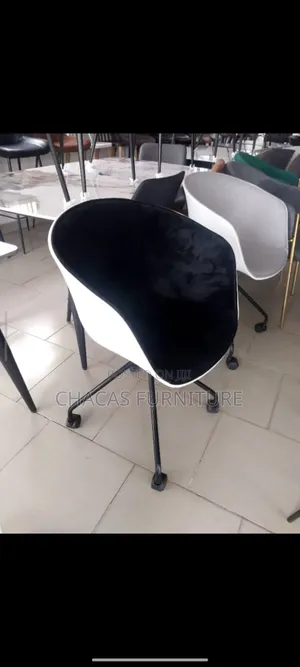 Modern Nordic Bolster Swivel Shell Chairs
