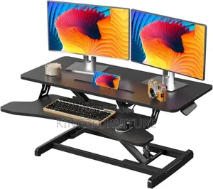 Worker Height-Adjustable Standing Desk Converter.