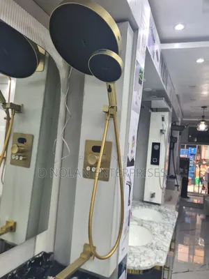Brushed Gold Product Is a Modern Thermostatic Shower