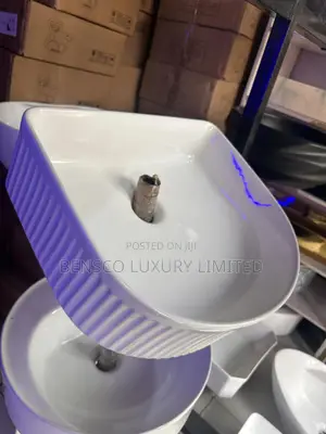 A White Ceramic Countertop Wash Hand Basin