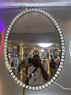 An Oval Crystal Led Bathroom Mirror