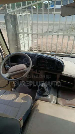 Toyota Coaster 2018 Gold