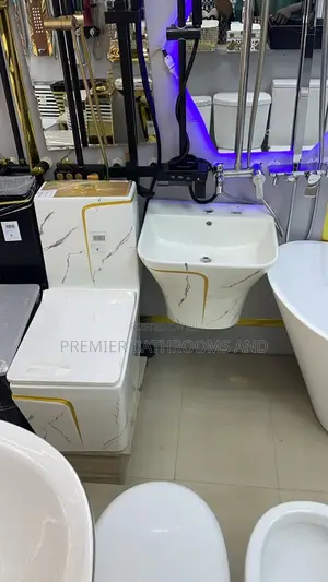Toilet and Hanging Gold and White