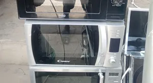 Candy Cmxg20ds Countertop Microwave Oven With a Grill Function.