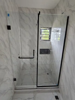 Luxury Tempered Glass Shower Cubicle With Black Accessories.