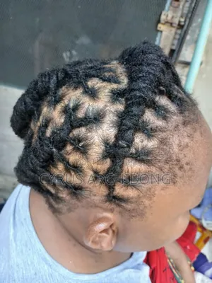 Lock And Relock Your Dread Hair Here