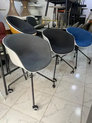Modern Shell Chair With Castors