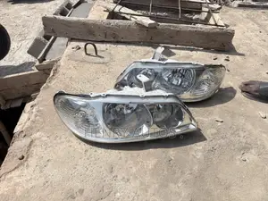 Set Headlights Sunny 2003