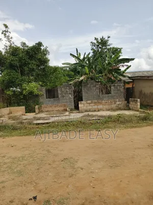 Full Plot of Land Fenced With Demolishable Structure