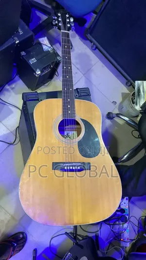 Uk Used Neat Acoustic Guitar