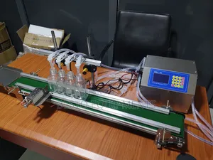 Automatic 4 Nozzle Digital Liquid Filling Machine With Conveyor.