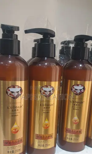 Curl Keeper l'Uodais Luxurious Curl Keeper Hair Spray Serum.