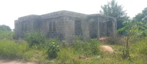 One Full Plot of Land and Three Bedrooms Apartment on It