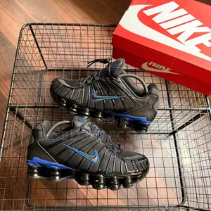 Cop the Nike Shox Tl Black Origin Blue