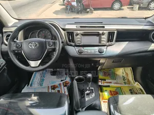 Toyota RAV4 XLE 4dr SUV AWD (2.5L 4cyl 6A) 2015 Orange