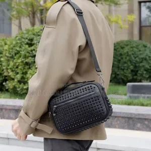 Luxury Update  
Studded Stylish Unisex Rivet Side Purse.