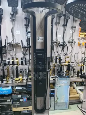 Black Multi-Function Shower Panel System Featuring a Waterfall Head