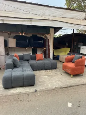 Elevate Your Space With This Cozy Shaped Sofa
