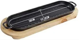 Cast Iron Serving Dish With Wooden Serving Board