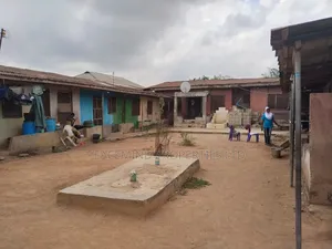 Plot of Land 3bed,13 Room and 6nos Shops in Ikotun by Governor Rd #65m