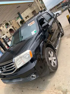 Honda Pilot Touring w/RES/Navi 4WD (3.5L 6cyl 5A) 2012 Black