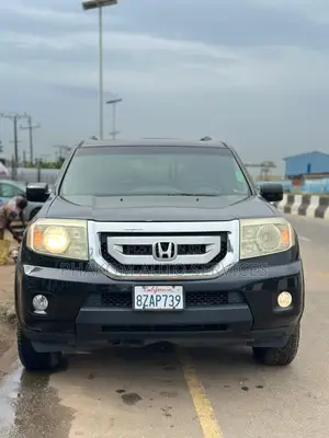 Honda Pilot Touring w/RES/Navi FWD (3.5L 6cyl 5A) 2010 Black