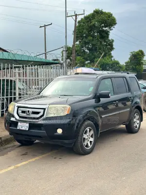 Honda Pilot Touring w/RES/Navi FWD (3.5L 6cyl 5A) 2010 Black
