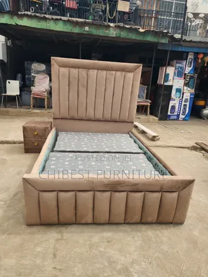 Padded Ulphostery 4.5by6 Bed Frame.