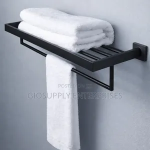Wall-Mounted Black Towel Rack Shelf Constructed From Stainless Steel