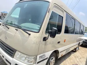 Toyota Coaster 2013 Gold