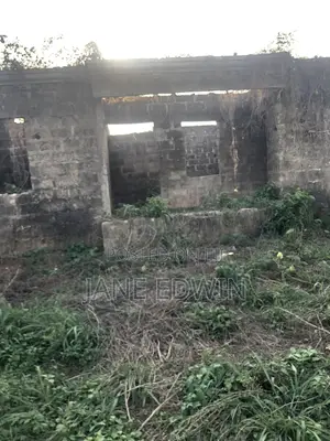 Uncompleted Building in a 50 by 75 Piece of Land