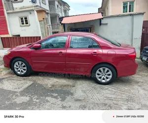 Toyota Corolla LE 4dr Sedan (1.8L 4 cyl 4A) 2009 Red