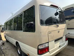 Toyota Coaster 2017 Gold