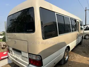 Toyota Coaster 2017 Gold