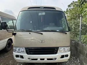 Toyota Coaster 2017 Gold