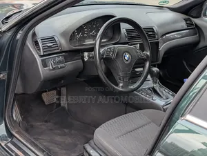 BMW 320i Sedan RWD 1999 Green