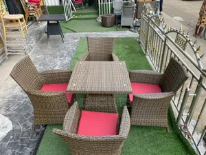 4-Seater Rattan Dining Set With a Square Glass Top Table
