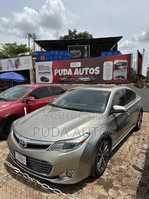 Toyota Avalon Limited Sedan FWD (3.5L 6cyl 6A) 2013 Gold