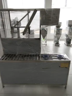 Semi Automatic C Way Gallon Filling Machine