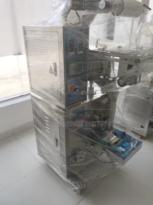 1 Kg Granule Packaging Machine With Auto Loader and Conveyor
