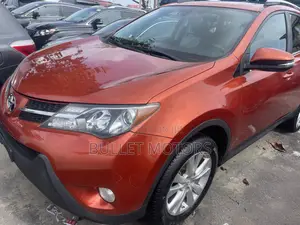 Toyota RAV4 Limited 4dr SUV AWD (2.5L 4cyl 6A) 2015 Orange
