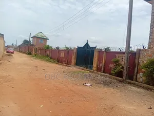 1340 SQM Fenced Land With Building on It