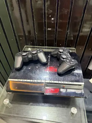 Ps3 With Two Controllers and Games