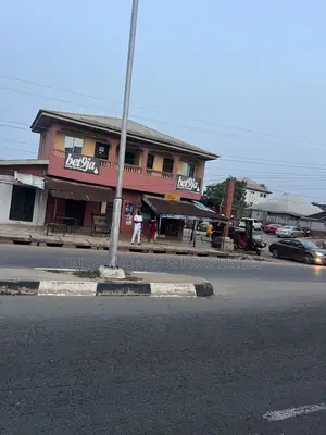 A Storey Building of Shops and Office Spaces