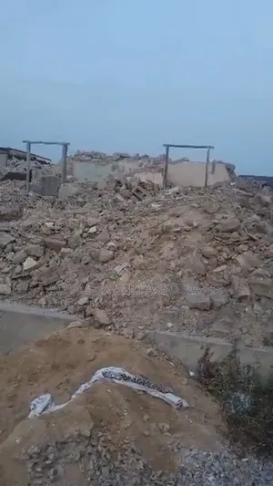 A Fenced Half Plot of Dry Land