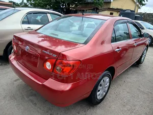 Toyota Corolla LE 2006 Orange