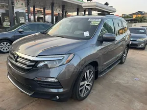 Honda Pilot Touring 4dr SUV 4WD (3.5L 6cyl 9A) 2016 Gray