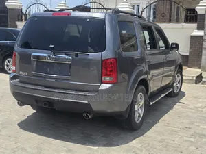 Honda Pilot Touring w/RES/Navi 4WD (3.5L 6cyl 5A) 2011 Gray