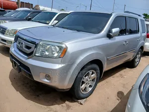 Honda Pilot Touring w/RES/Navi 4WD (3.5L 6cyl 5A) 2010 Silver